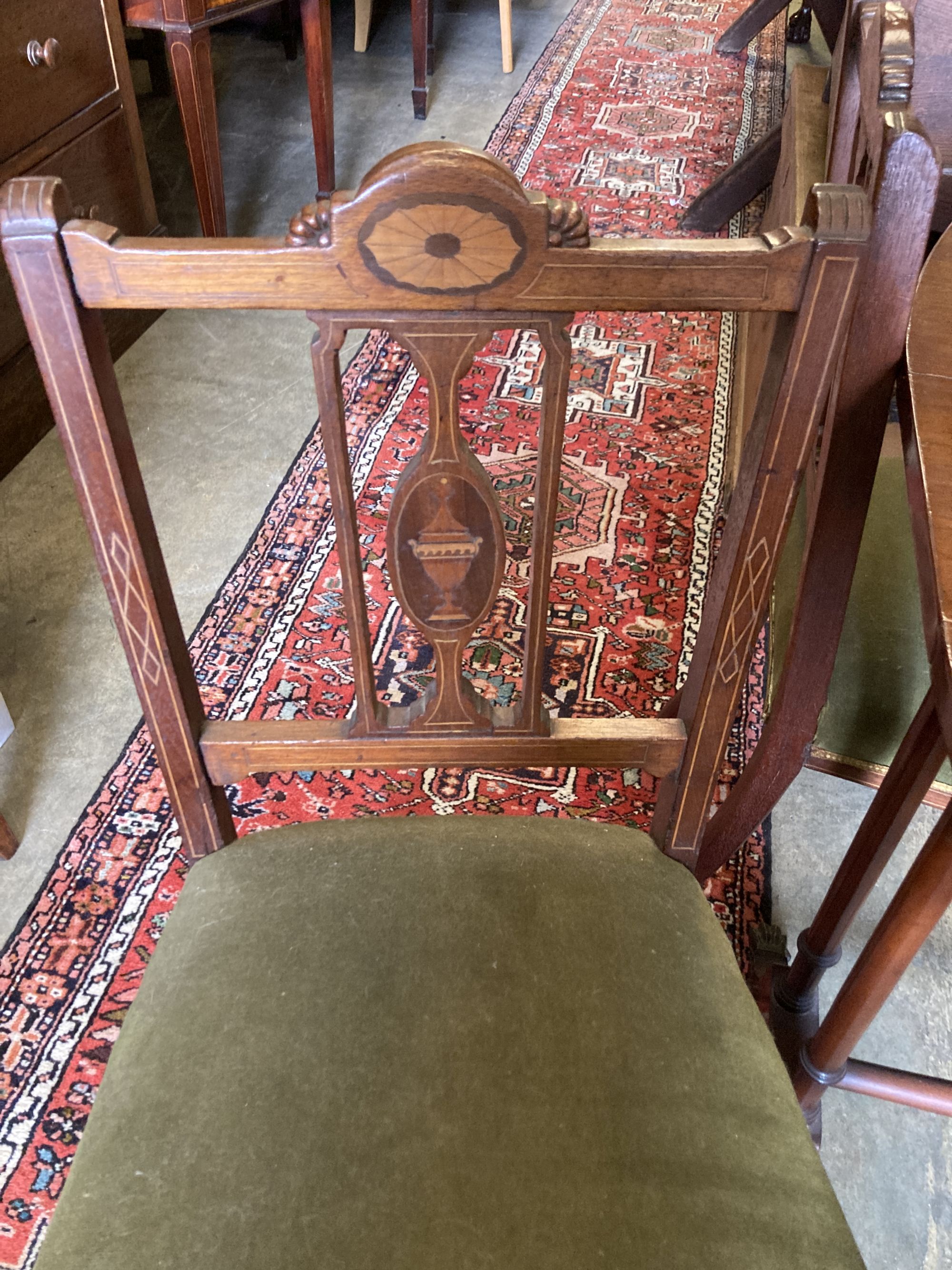 A Victorian style banded mahogany drop flap dining table, 138cm extended together with a set of four Edwardian inlaid mahogany dining c